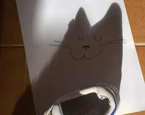 影子创意美术作品《可爱小猫》