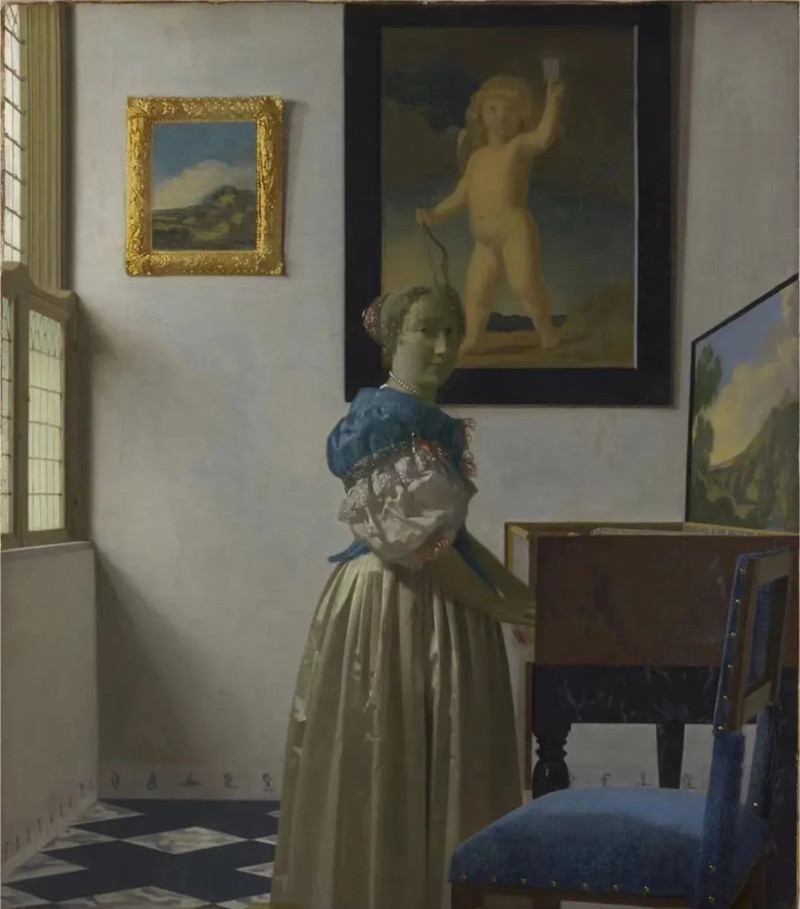 约翰内斯·维米尔世界名画《小键琴边的女子》.jpg